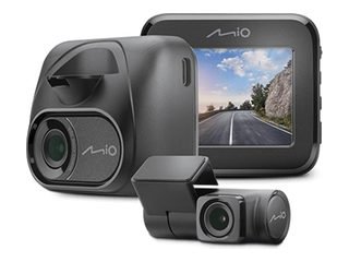 Mio MiVue C595WD dash cam showing a road on its small screen, with a smaller rear camera in front